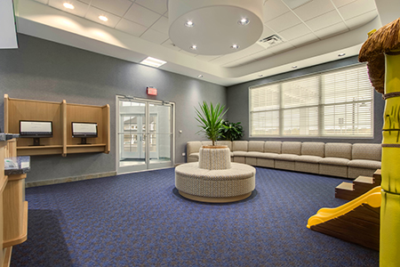 Waiting area with game wall